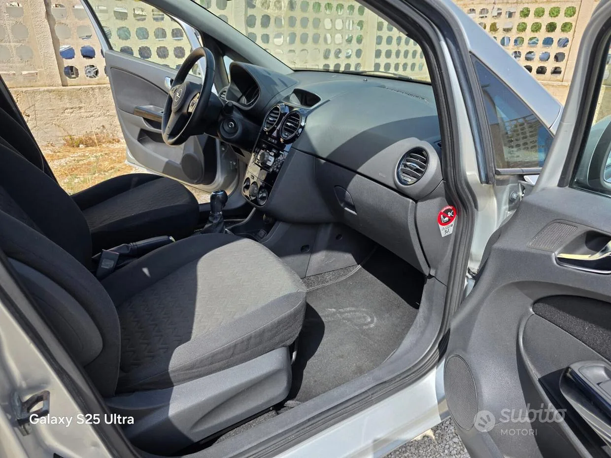 Opel Corsa — foto 11